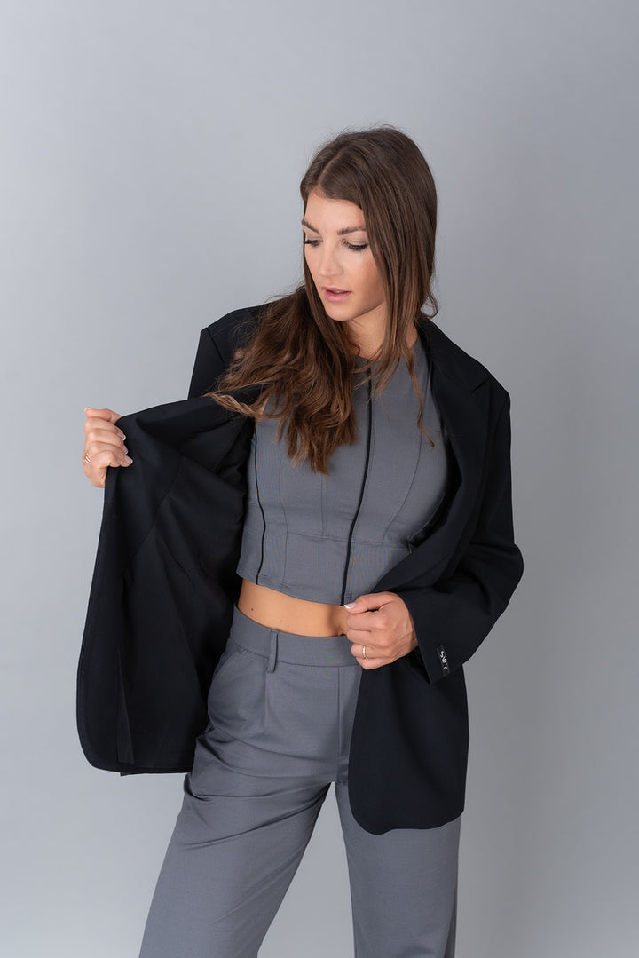 oversized black blazer with office grey pants & tank top